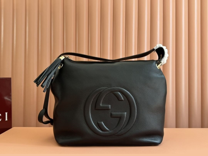 G*u*i shopping bags